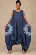 Load image into Gallery viewer, African American woman modeling the navy oversized jumpsuit
