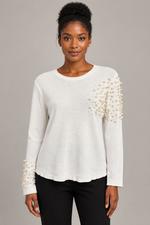 Load image into Gallery viewer, Model wearing the ivory pearl-embellished top
