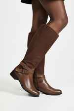 Load image into Gallery viewer, Style 9190 riding boots in brown on Black woman's leg
